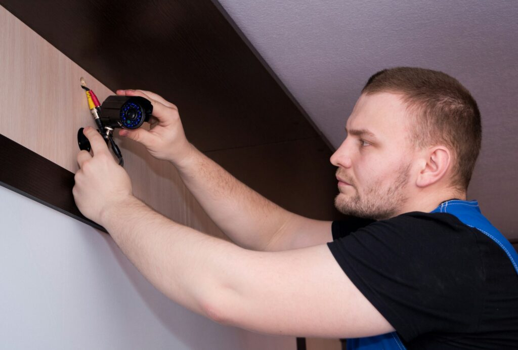 Technician installing equipment