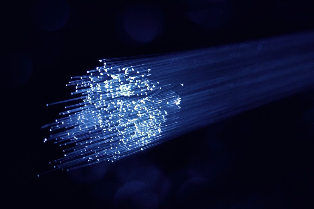 Fiber optic strands carrying light