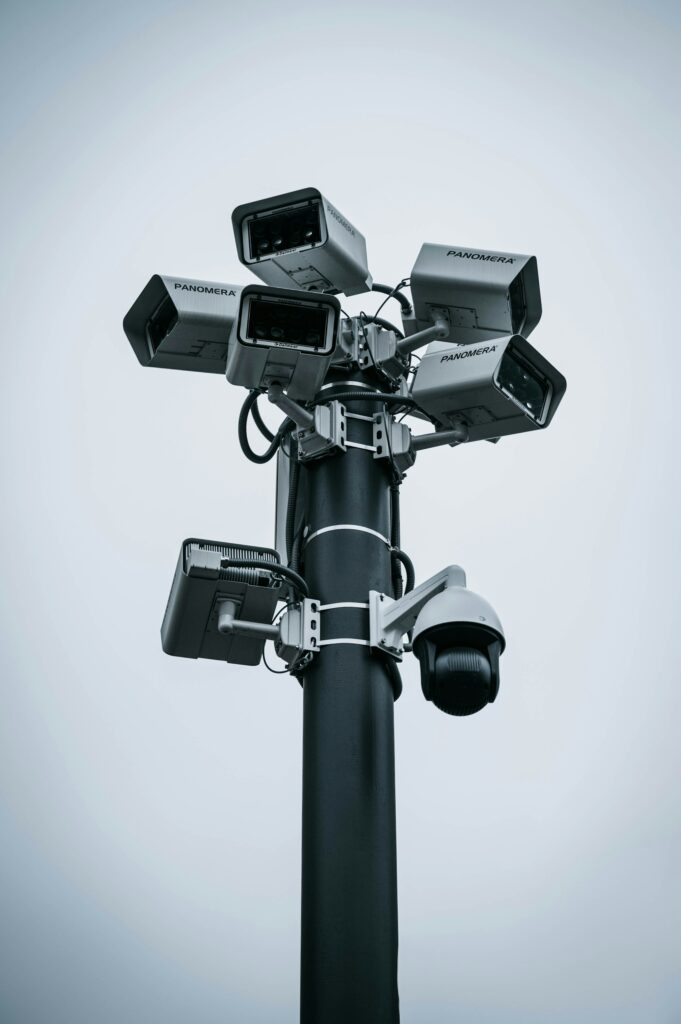 Dome and bullet security cameras on one pole