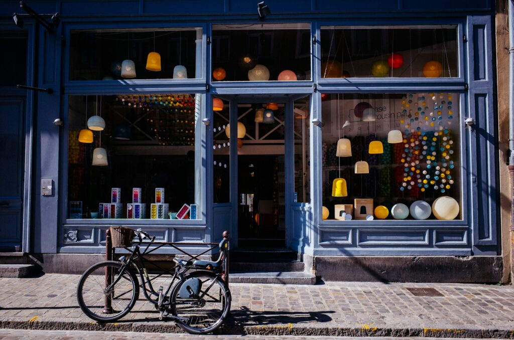 Small business storefront at dusk