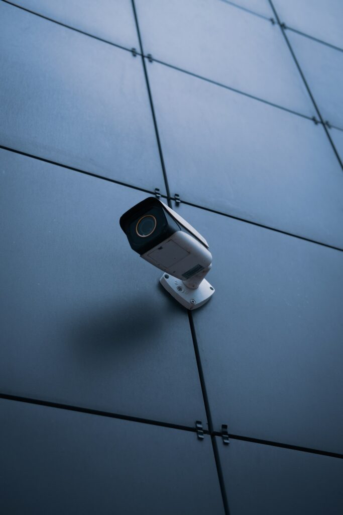 Security camera mounted on a building